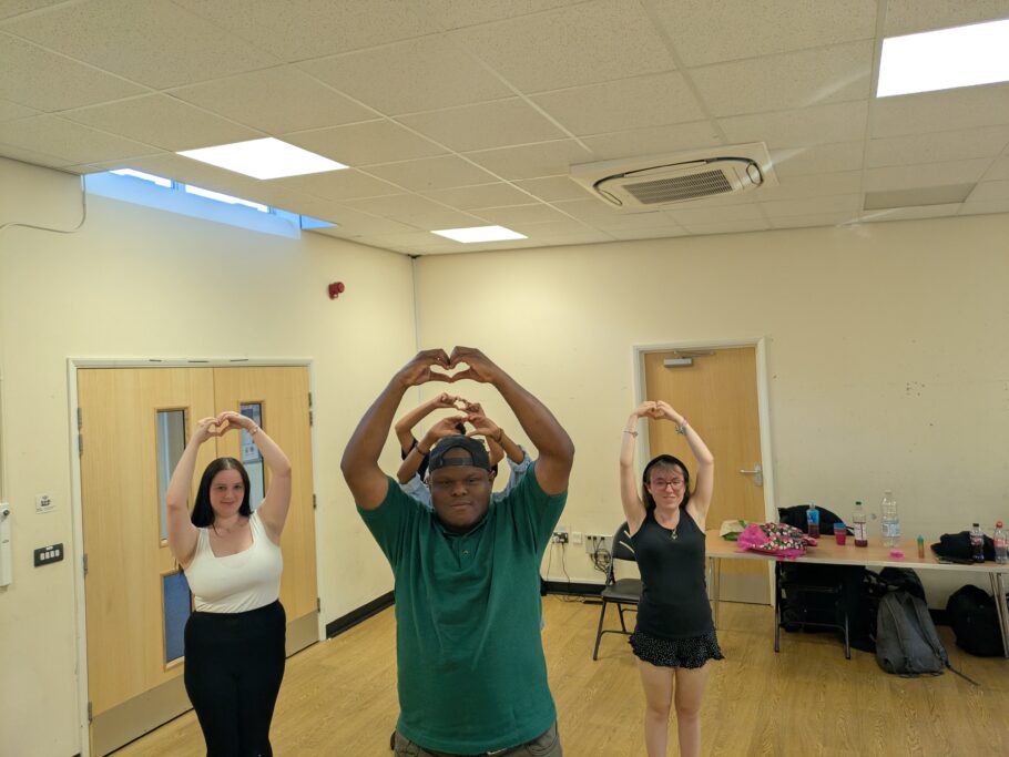 A group of young people doing a dance routine